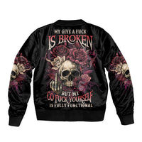 Black bomber jacket with large skull and rose graphic on the back