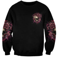 Unisex black crewneck sweatshirt, small skull roses emblem on chest; rose skull sleeves.