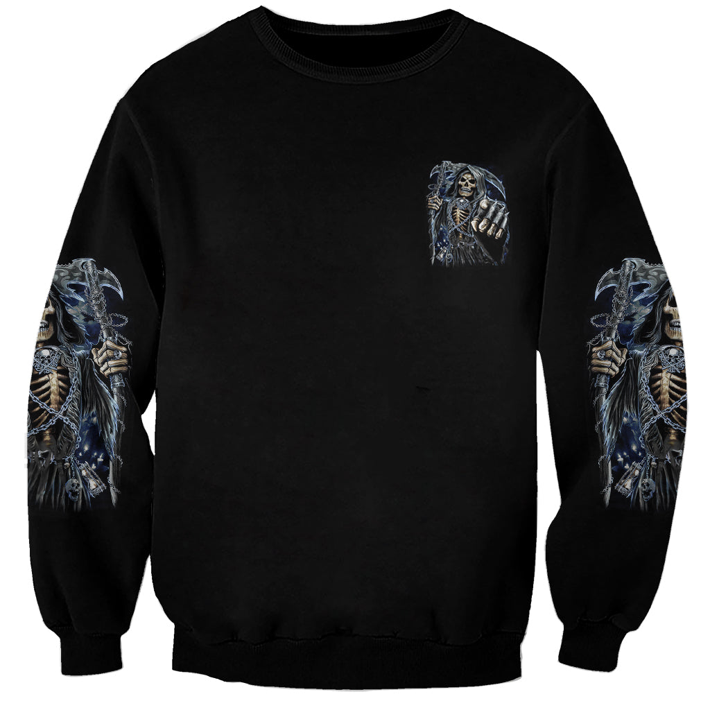 Unisex black sweatshirt with small blue skull chest print and matching sleeve graphics