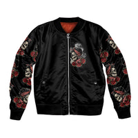 Black satin bomber jacket with front zipper, skull rose chest graphic and floral sleeve print