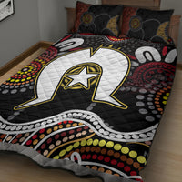 Black quilt with white lightning arch and gold star, multicolor dot accents