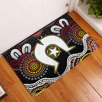 Multicolor Aboriginal pattern rubber doormat with large white animal silhouette and star