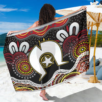 Aboriginal pattern sarong with black base, multicolor dot swirls and central star motif