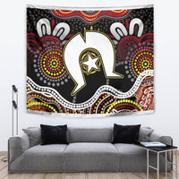 Multicolor Aboriginal-pattern tapestry featuring central white bird/animal figure on black base