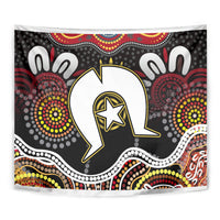 Multicolor Aboriginal-pattern tapestry corner view with central white bird/animal figure on black