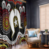 Black window curtain panel with multicolor Aboriginal-style dot and figure artwork.