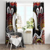 Multicolor window curtain panels with prominent white figure outlines and red dot elements.