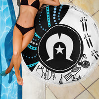 Round beach blanket with fringe, bold Aboriginal-style black, white, and turquoise artwork