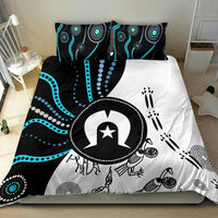 Multicolor Aboriginal pattern bedding set with bold circular emblem on duvet and two pillows