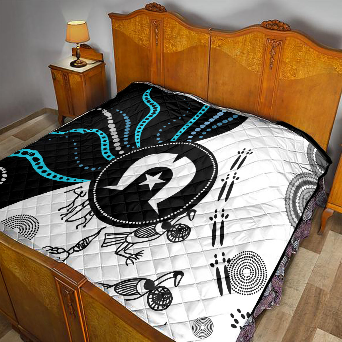 Aboriginal Pattern Torest Strait Island quilt TS04 laid on bed, black, white, and teal pattern