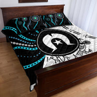 Multicolor Aboriginal pattern quilt bed set on bed with black, white, turquoise artwork and matching pillow