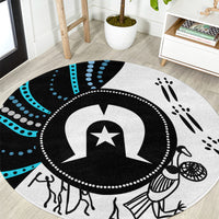 Round multicolor aboriginal pattern carpet with central star emblem and paw prints