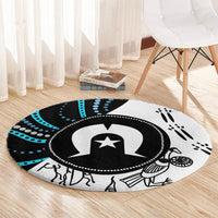 Round rug with black-and-white star emblem and teal dotted arc pattern
