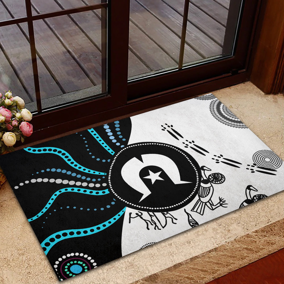 Black, white, and blue Aboriginal patterned rubber doormat with central circular emblem