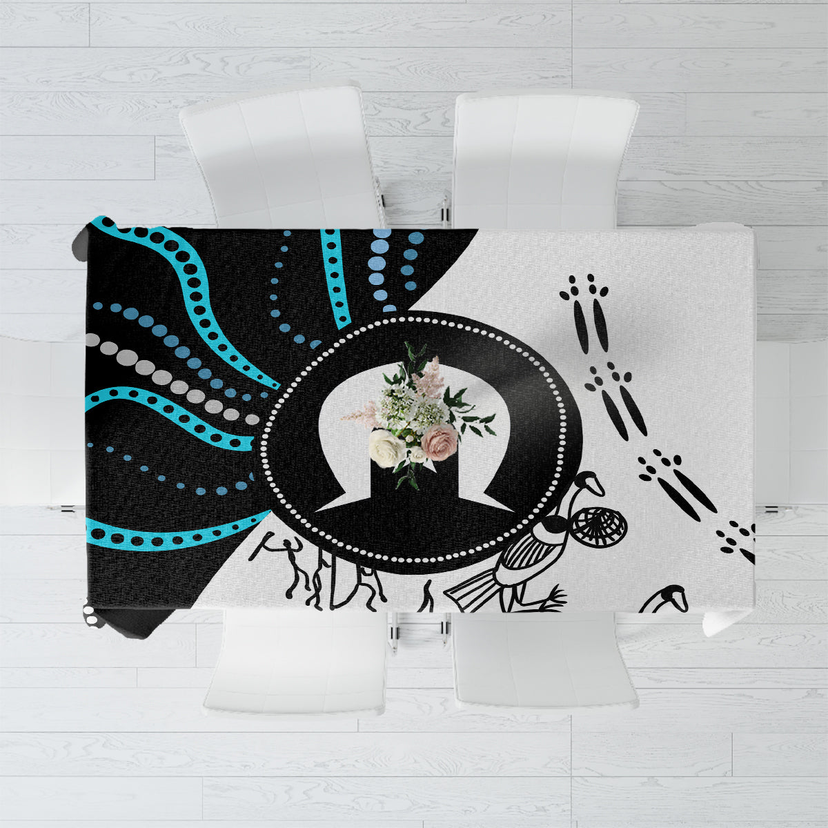 Aboriginal pattern tablecloth with black, white, and teal motifs, circular emblem design