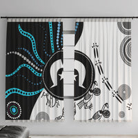 Two window curtains side-by-side with Aboriginal pattern in black, white, and teal tones