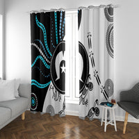 Two window curtains featuring Aboriginal-style circular and wave designs in black/white/teal
