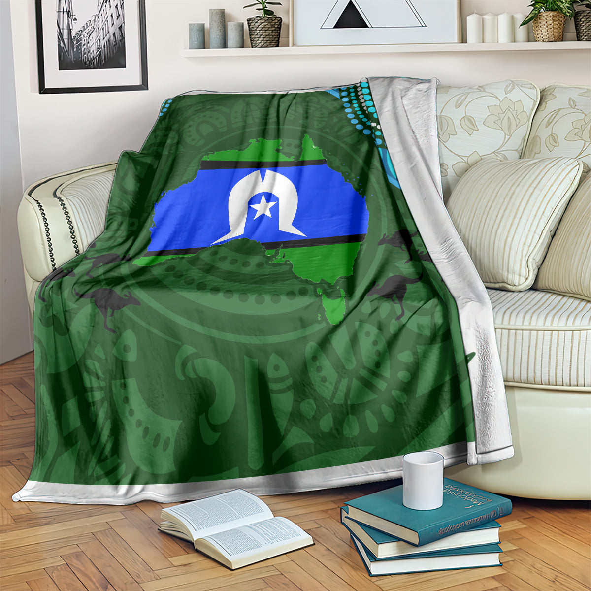 Green Aboriginal-inspired throw blanket with flag graphic and teal dotted border