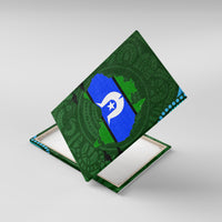 Green Aboriginal pattern canvas wall art angled view with blue emblem panel