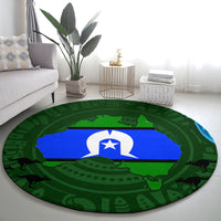 Round green patterned carpet with blue center flag and white star crest, round shape