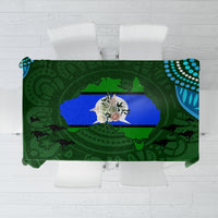 Green Aboriginal pattern tablecloth with blue and dark shapes, rectangular coverage