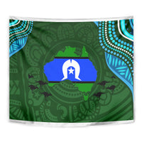 Green Aboriginal pattern tapestry with central star and animal silhouettes, close-up wall hanging
