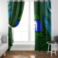 Green patterned window curtain panels with blue stripe and white star, framed by teal swirls.