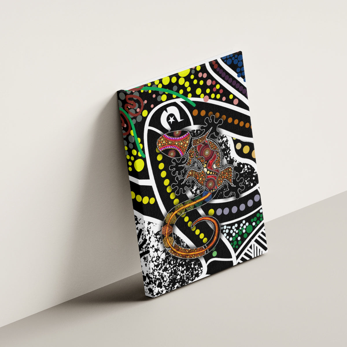 Multicolor lizard motif canvas wall art, black-and-white base with green and orange dots.