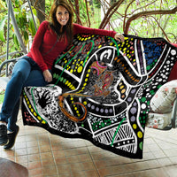 Multicolor Aboriginal lizard pattern dot art quilt held on a porch with large graphic