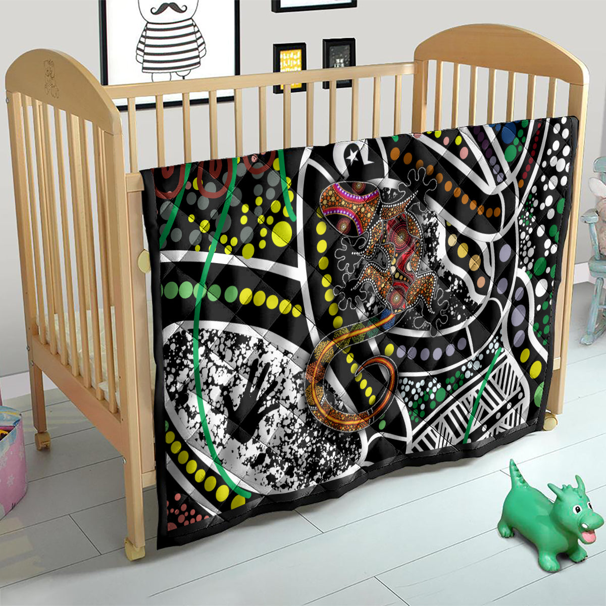 Multicolor Aboriginal lizard pattern dot art quilt on a child bed frame