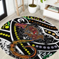 Round lizard pattern rug with ornate central lizard graphic and multicolor dotted trim