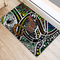 Multicolor rubber doormat with central lizard artwork, dotted accents, and green swirl border