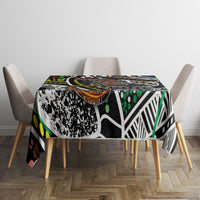 Rectangular tablecloth with multicolor abstract Aboriginal-style dot, stripe, and snake pattern