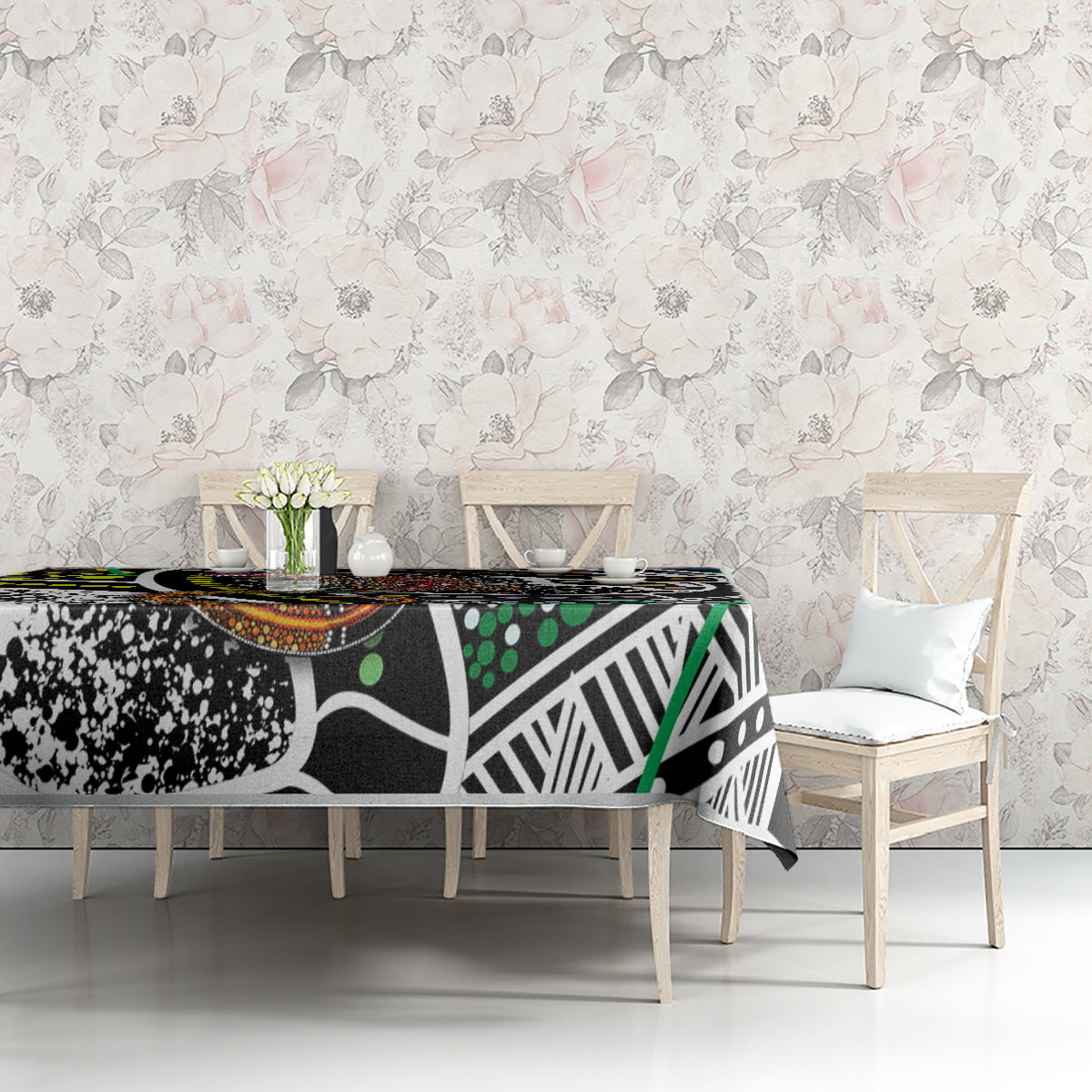 Multicolor patterned tablecloth featuring black, white, green, and orange circular dot details