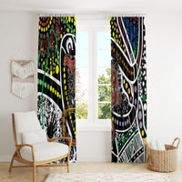 Multicolor Aboriginal dot art window curtains with colorful dots and swirls, hung across two panels.