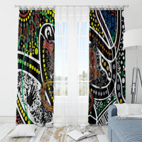 Multicolor Aboriginal dot art window curtains with sheer light streaming through between panels.