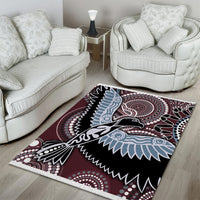 Multicolor Aboriginal bird area rug with maroon background, black field, blue and white accents