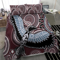 Bird bedding set featuring maroon circles and swirls with black and light blue bird artwork