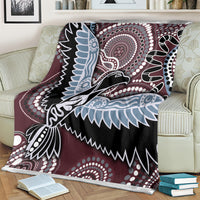 Bird-and-circle blanket in maroon, black, light blue and white tribal artwork