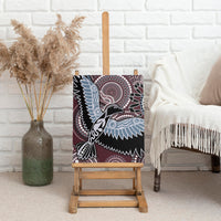 Aboriginal bird canvas wall art on stand, with blue wings, maroon circles, and black accents