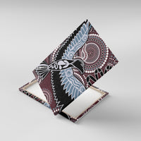 Aboriginal bird canvas wall art shown at angle, blue wing details with dot background
