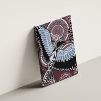 Aboriginal bird canvas wall art mounted on wall, blue wings and maroon dot patterns