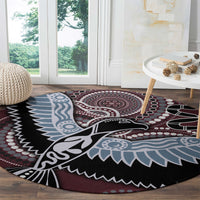 Round Aboriginal pattern bird rug with circular medallion, black background, blue and maroon tones