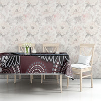 Bird-inspired Aboriginal pattern tablecloth on table in maroon, black, blue, and white geometric print.