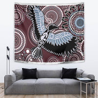 Maroon Aboriginal-style tapestry with blue bird and dotted circular patterns, wall hanging