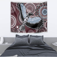 Maroon Aboriginal-pattern wall tapestry featuring a blue bird with swirling dot mandalas