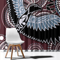 Close-up bird motif window curtain with burgundy, black, and light-blue feather shapes