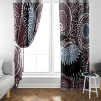Two-panel window curtain with burgundy and black background and light-blue bird design
