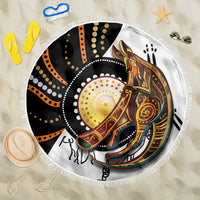 Round beach blanket with kangaroo dot art, black orange and white, fringed edge