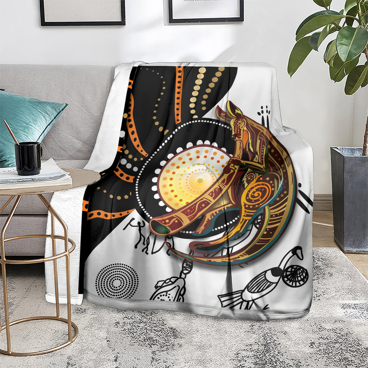 Aboriginal kangaroo pattern dot art blanket laid on chair, white background with dark accents